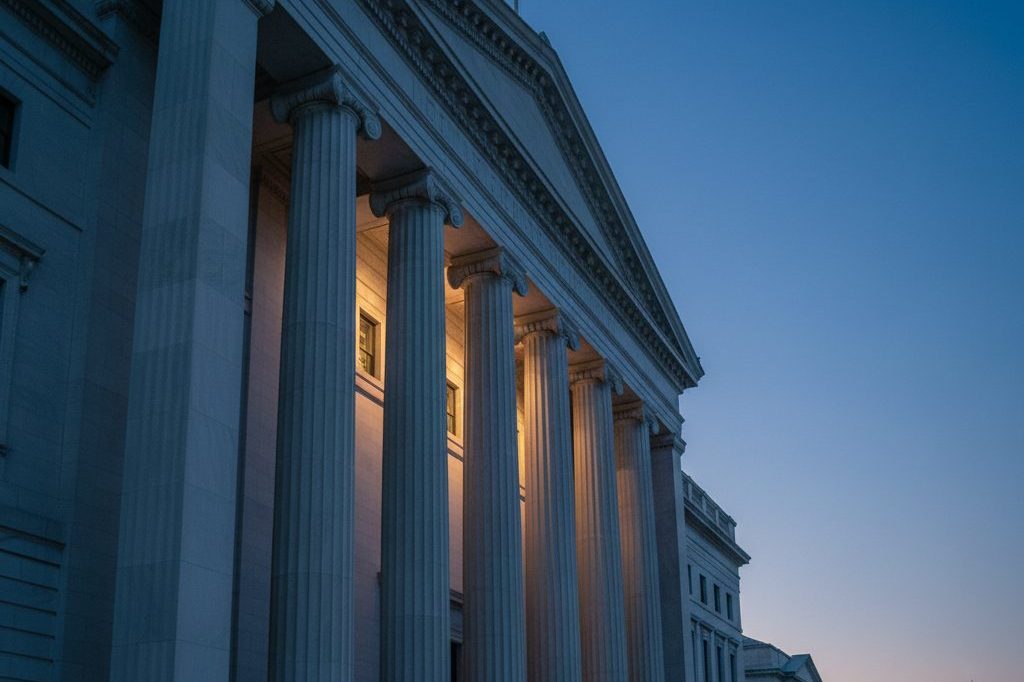 Federal neoclassical government building facade at blue hour